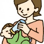 赤ちゃんにミルクを与える母親